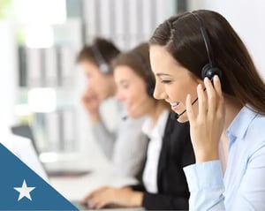 row of truck insurance specialists at their desks