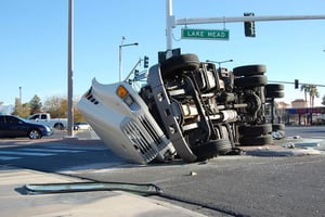 semi truck roll over crash on street